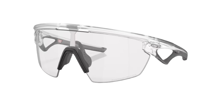 Sluneční brýle OAKLEY Sphaera Matte Clear Frame/Clear To Black Iridium Photochromic Lenses