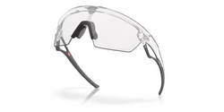 Sluneční brýle OAKLEY Sphaera Matte Clear Frame/Clear To Black Iridium Photochromic Lenses